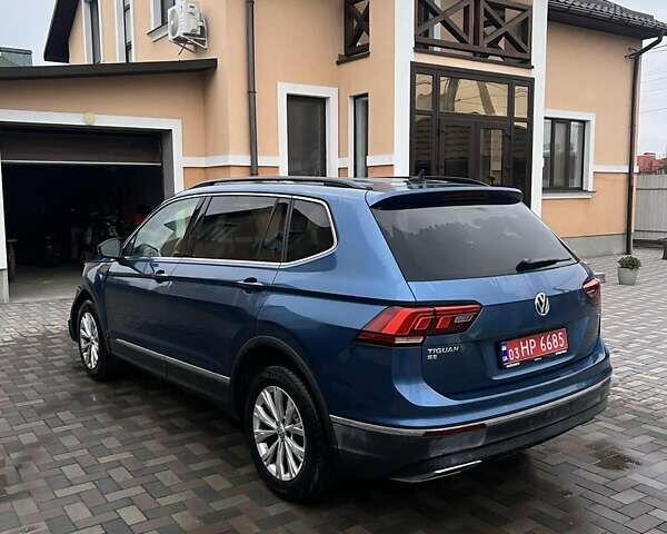 Синій Фольксваген Тігуан, об'ємом двигуна 2 л та пробігом 193 тис. км за 14700 $, фото 1 на Automoto.ua