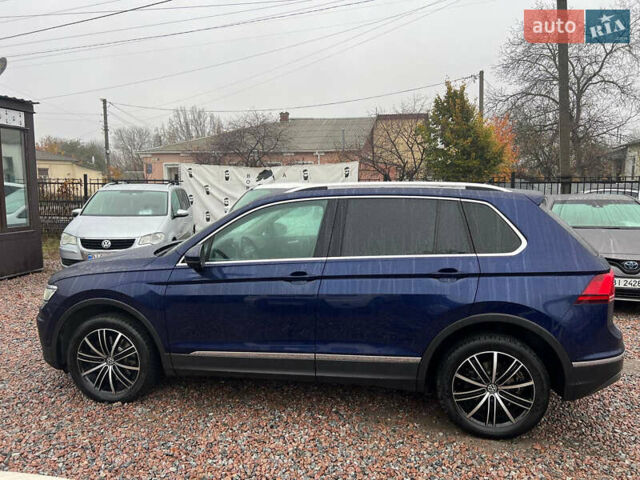 Синий Фольксваген Тигуан, объемом двигателя 1.98 л и пробегом 234 тыс. км за 26500 $, фото 3 на Automoto.ua