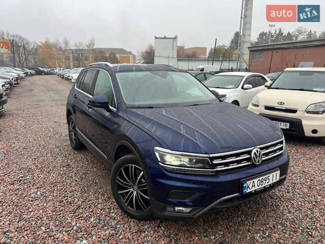 Синий Фольксваген Тигуан, объемом двигателя 1.98 л и пробегом 234 тыс. км за 26500 $, фото 1 на Automoto.ua