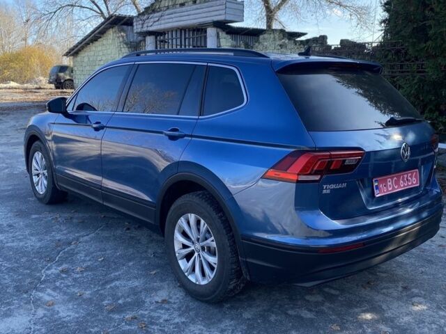 Синий Фольксваген Тигуан, объемом двигателя 2 л и пробегом 160 тыс. км за 15900 $, фото 4 на Automoto.ua