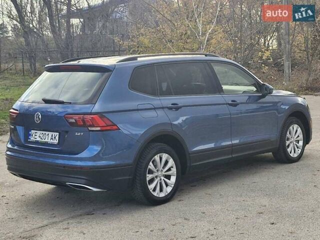 Синий Фольксваген Тигуан, объемом двигателя 2 л и пробегом 174 тыс. км за 16500 $, фото 4 на Automoto.ua
