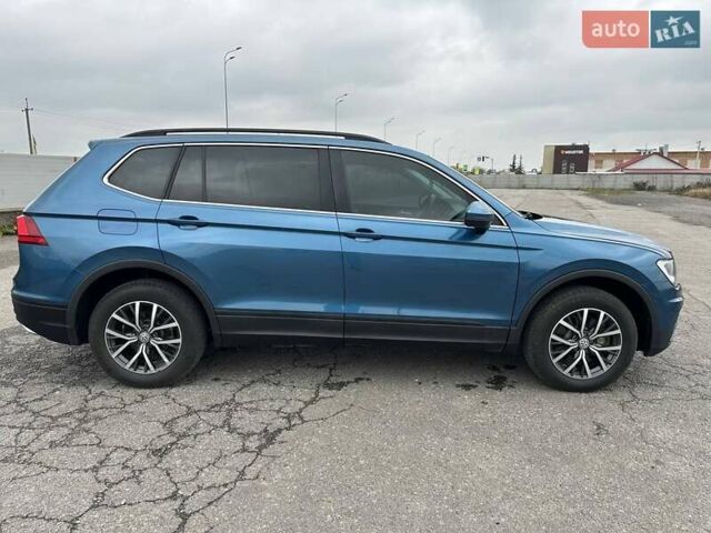 Синий Фольксваген Тигуан, объемом двигателя 2 л и пробегом 213 тыс. км за 17800 $, фото 4 на Automoto.ua