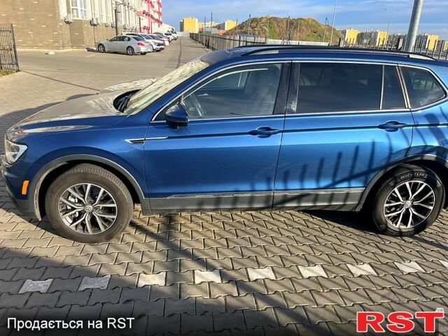 Синий Фольксваген Тигуан, объемом двигателя 2 л и пробегом 150 тыс. км за 25000 $, фото 1 на Automoto.ua