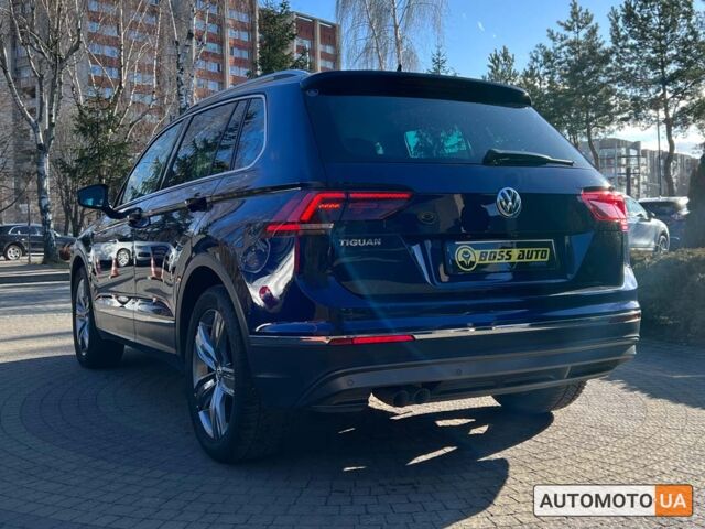 Синій Фольксваген Тігуан, об'ємом двигуна 2 л та пробігом 164 тис. км за 25300 $, фото 4 на Automoto.ua