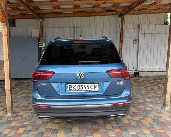 Синій Фольксваген Тігуан, об'ємом двигуна 1.98 л та пробігом 62 тис. км за 21000 $, фото 2 на Automoto.ua