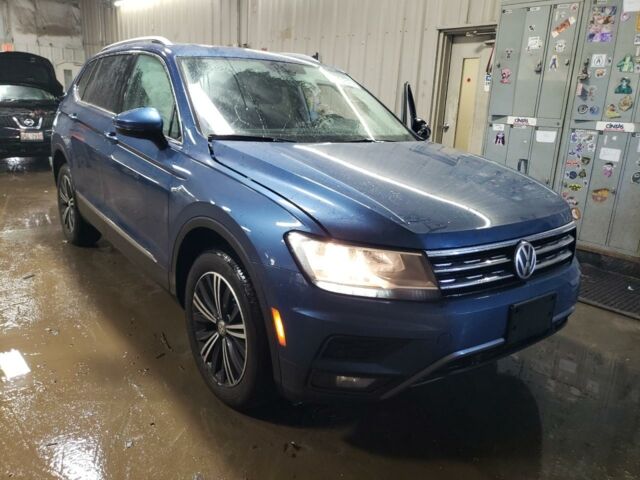 Синий Фольксваген Тигуан, объемом двигателя 2 л и пробегом 137 тыс. км за 14300 $, фото 2 на Automoto.ua
