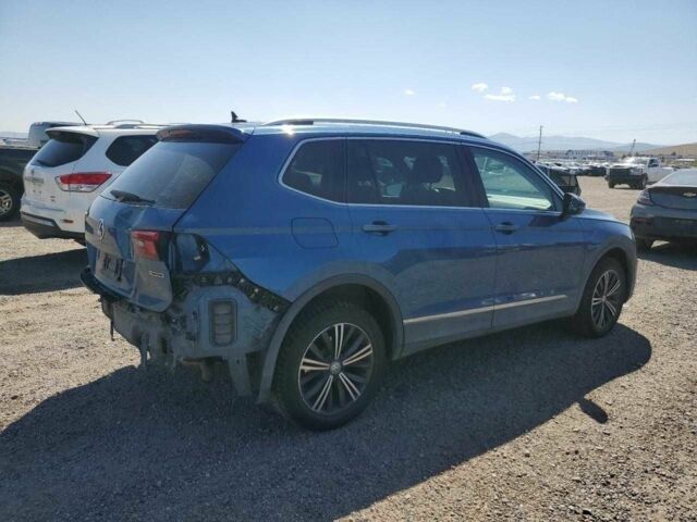 Синий Фольксваген Тигуан, объемом двигателя 2 л и пробегом 56 тыс. км за 3500 $, фото 3 на Automoto.ua