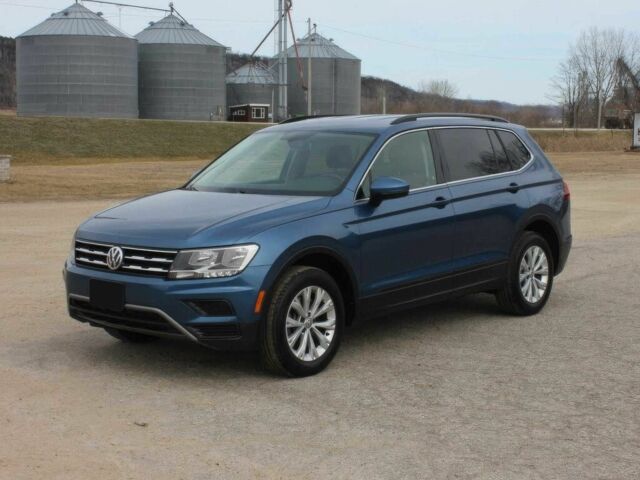 Синий Фольксваген Тигуан, объемом двигателя 2 л и пробегом 39 тыс. км за 11000 $, фото 2 на Automoto.ua