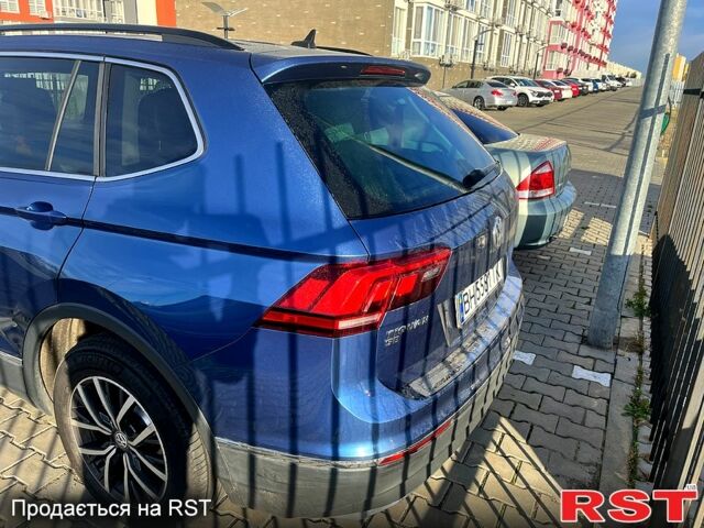 Синий Фольксваген Тигуан, объемом двигателя 2 л и пробегом 150 тыс. км за 25000 $, фото 2 на Automoto.ua