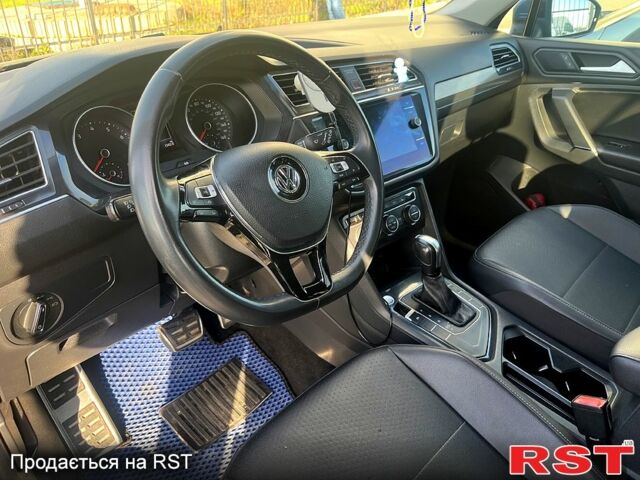 Синий Фольксваген Тигуан, объемом двигателя 2 л и пробегом 150 тыс. км за 25000 $, фото 6 на Automoto.ua