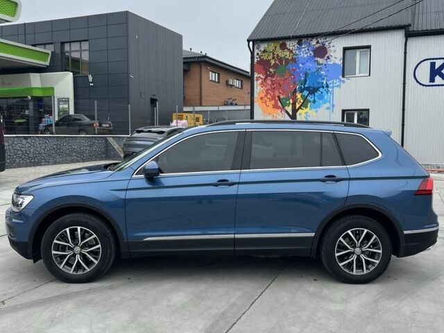 Синий Фольксваген Тигуан, объемом двигателя 2 л и пробегом 69 тыс. км за 17500 $, фото 3 на Automoto.ua