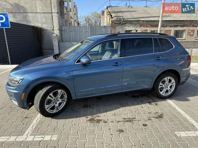 Синий Фольксваген Тигуан, объемом двигателя 2 л и пробегом 43 тыс. км за 19500 $, фото 2 на Automoto.ua