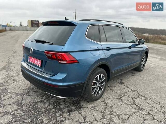 Синий Фольксваген Тигуан, объемом двигателя 2 л и пробегом 213 тыс. км за 17800 $, фото 35 на Automoto.ua