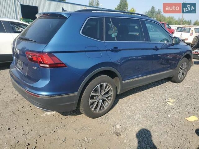 Синий Фольксваген Тигуан, объемом двигателя 2 л и пробегом 136 тыс. км за 4300 $, фото 2 на Automoto.ua