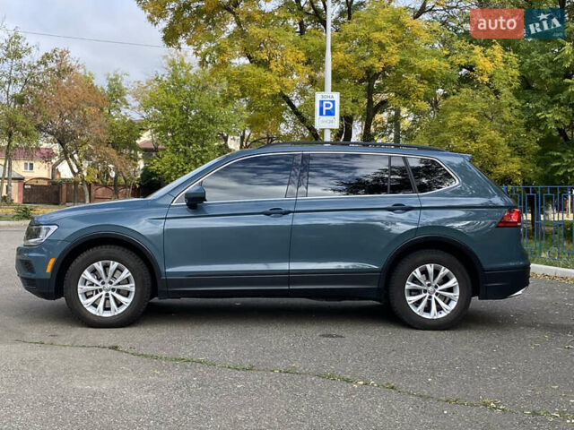 Синій Фольксваген Тігуан, об'ємом двигуна 1.98 л та пробігом 63 тис. км за 23299 $, фото 1 на Automoto.ua