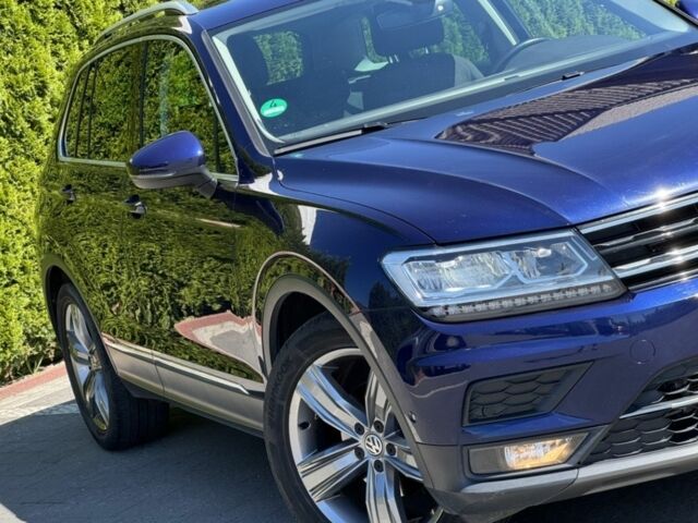 Синій Фольксваген Тігуан, об'ємом двигуна 2 л та пробігом 165 тис. км за 23500 $, фото 3 на Automoto.ua