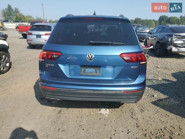 Синий Фольксваген Тигуан, объемом двигателя 2 л и пробегом 136 тыс. км за 4300 $, фото 5 на Automoto.ua