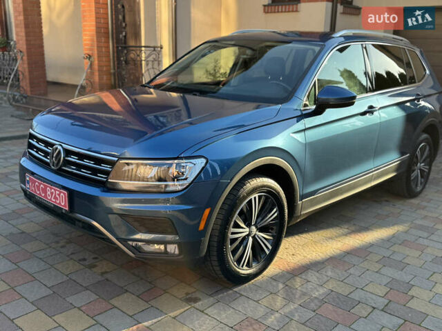 Синий Фольксваген Тигуан, объемом двигателя 1.98 л и пробегом 166 тыс. км за 19200 $, фото 2 на Automoto.ua