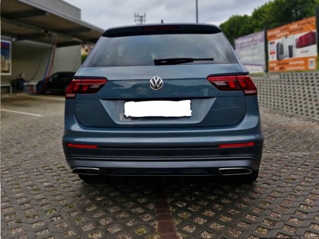 Синій Фольксваген Тігуан, об'ємом двигуна 2 л та пробігом 126 тис. км за 11200 $, фото 1 на Automoto.ua