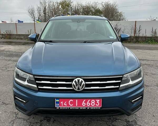 Синий Фольксваген Тигуан, объемом двигателя 2 л и пробегом 213 тыс. км за 17800 $, фото 1 на Automoto.ua