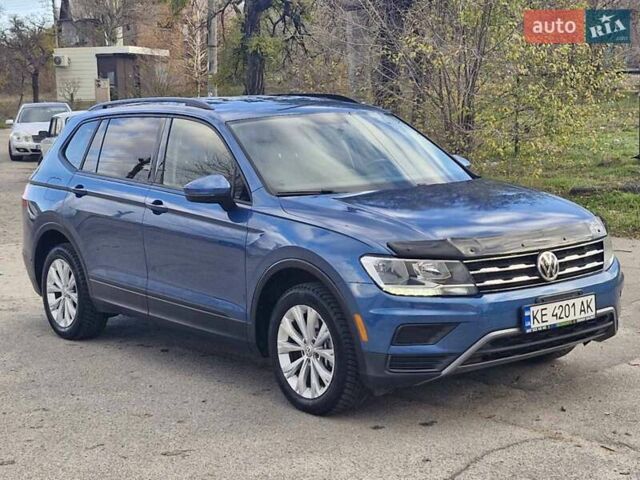 Синий Фольксваген Тигуан, объемом двигателя 2 л и пробегом 174 тыс. км за 16500 $, фото 2 на Automoto.ua