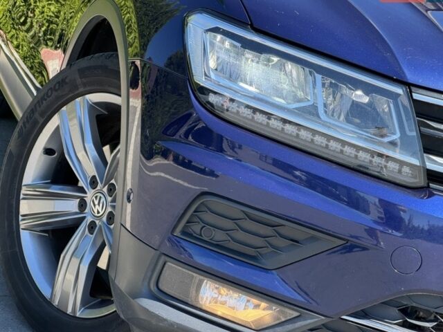 Синій Фольксваген Тігуан, об'ємом двигуна 2 л та пробігом 165 тис. км за 23500 $, фото 4 на Automoto.ua