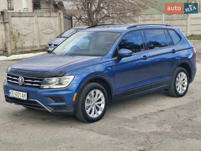 Синий Фольксваген Тигуан, объемом двигателя 2 л и пробегом 174 тыс. км за 16500 $, фото 1 на Automoto.ua
