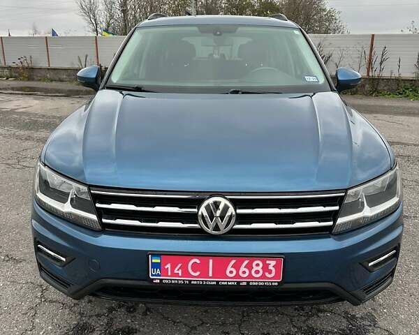Синий Фольксваген Тигуан, объемом двигателя 2 л и пробегом 213 тыс. км за 17800 $, фото 2 на Automoto.ua