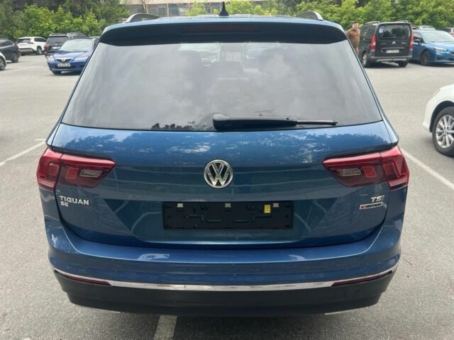 Синій Фольксваген Тігуан, об'ємом двигуна 2 л та пробігом 214 тис. км за 16500 $, фото 4 на Automoto.ua