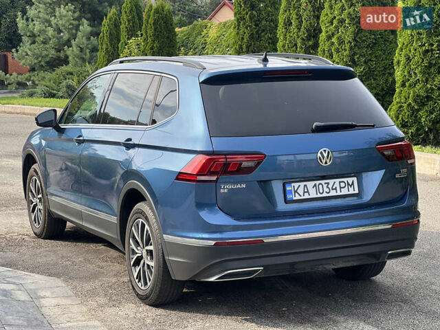Синій Фольксваген Тігуан, об'ємом двигуна 1.98 л та пробігом 215 тис. км за 16000 $, фото 2 на Automoto.ua