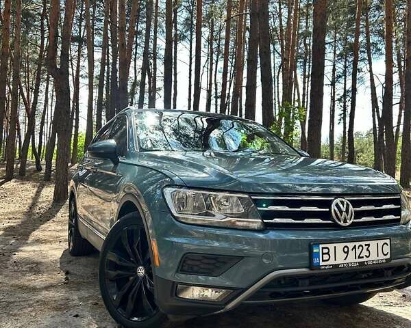 Синий Фольксваген Тигуан, объемом двигателя 1.98 л и пробегом 107 тыс. км за 22000 $, фото 1 на Automoto.ua