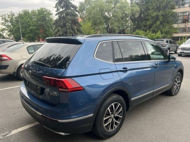 Синій Фольксваген Тігуан, об'ємом двигуна 2 л та пробігом 214 тис. км за 16500 $, фото 5 на Automoto.ua