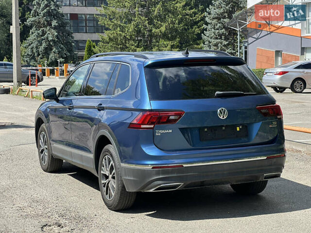 Синій Фольксваген Тігуан, об'ємом двигуна 1.98 л та пробігом 215 тис. км за 16000 $, фото 10 на Automoto.ua