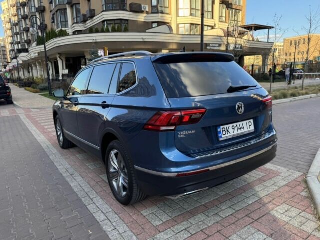 Синий Фольксваген Тигуан, объемом двигателя 2 л и пробегом 124 тыс. км за 23500 $, фото 3 на Automoto.ua