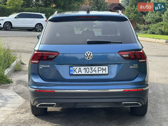 Синій Фольксваген Тігуан, об'ємом двигуна 1.98 л та пробігом 215 тис. км за 16000 $, фото 3 на Automoto.ua