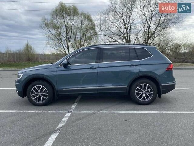 Синій Фольксваген Тігуан, об'ємом двигуна 2 л та пробігом 109 тис. км за 22000 $, фото 29 на Automoto.ua