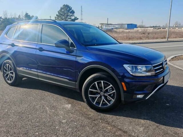 Синий Фольксваген Тигуан, объемом двигателя 2 л и пробегом 121 тыс. км за 12400 $, фото 1 на Automoto.ua