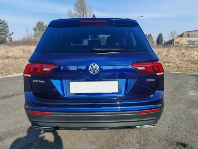 Синий Фольксваген Тигуан, объемом двигателя 2 л и пробегом 121 тыс. км за 12400 $, фото 5 на Automoto.ua