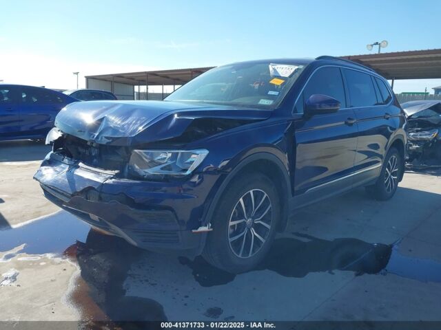 Синий Фольксваген Тигуан, объемом двигателя 2 л и пробегом 99 тыс. км за 13700 $, фото 2 на Automoto.ua