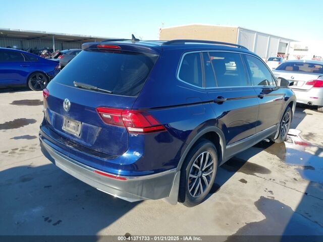 Синий Фольксваген Тигуан, объемом двигателя 2 л и пробегом 99 тыс. км за 13700 $, фото 5 на Automoto.ua