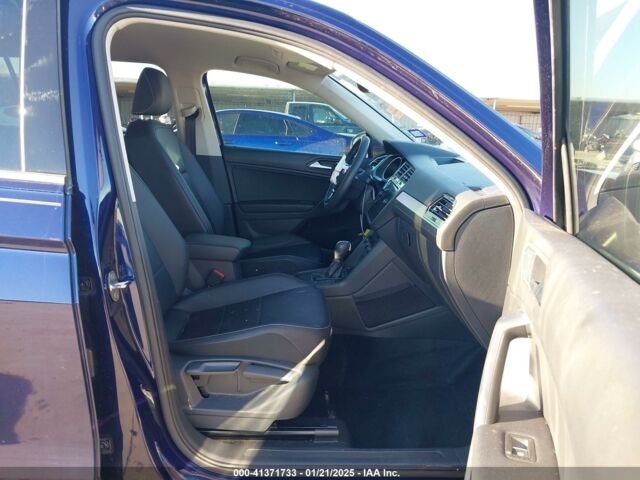 Синий Фольксваген Тигуан, объемом двигателя 2 л и пробегом 99 тыс. км за 13700 $, фото 6 на Automoto.ua