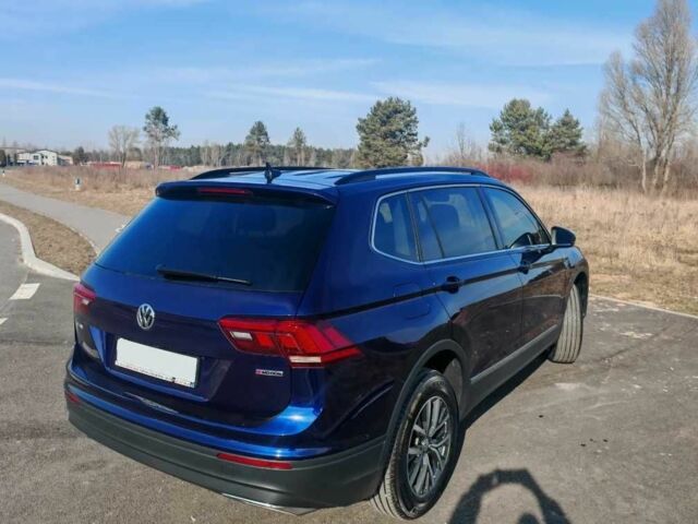 Синий Фольксваген Тигуан, объемом двигателя 2 л и пробегом 121 тыс. км за 12400 $, фото 4 на Automoto.ua