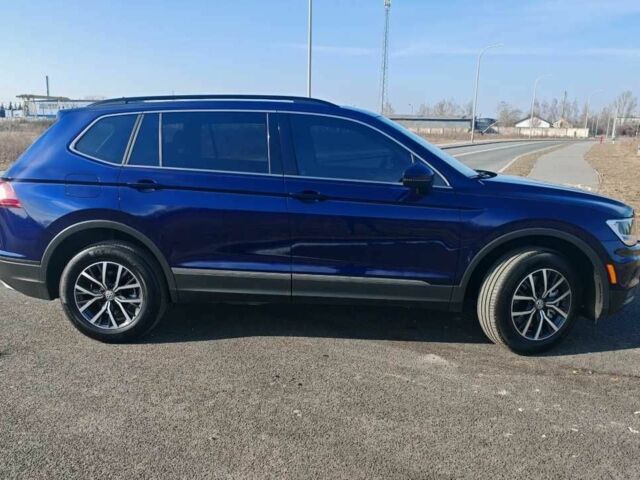 Синий Фольксваген Тигуан, объемом двигателя 2 л и пробегом 121 тыс. км за 12400 $, фото 2 на Automoto.ua