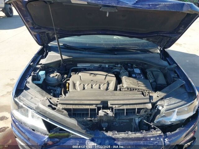 Синий Фольксваген Тигуан, объемом двигателя 2 л и пробегом 99 тыс. км за 13700 $, фото 9 на Automoto.ua