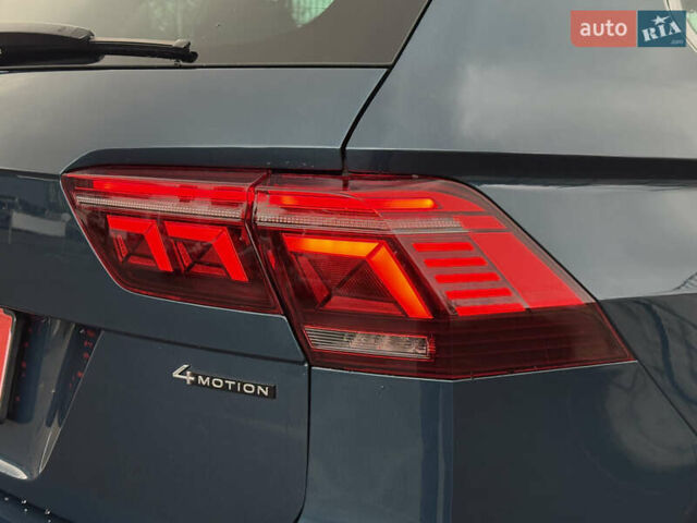 Синий Фольксваген Тигуан, объемом двигателя 2 л и пробегом 189 тыс. км за 31999 $, фото 76 на Automoto.ua