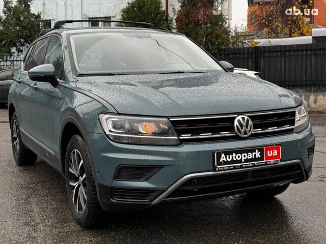 Синий Фольксваген Тигуан, объемом двигателя 2 л и пробегом 74 тыс. км за 21990 $, фото 2 на Automoto.ua