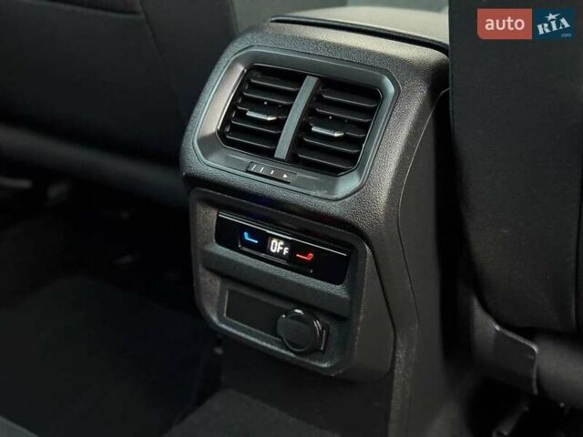 Синий Фольксваген Тигуан, объемом двигателя 2 л и пробегом 136 тыс. км за 33400 $, фото 26 на Automoto.ua