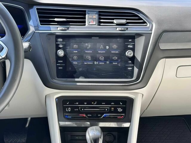 Синий Фольксваген Тигуан, объемом двигателя 2 л и пробегом 11 тыс. км за 19000 $, фото 8 на Automoto.ua