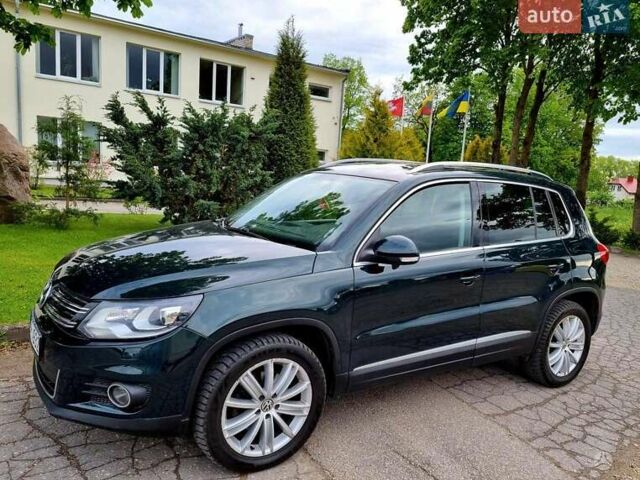 Зеленый Фольксваген Тигуан, объемом двигателя 1.97 л и пробегом 278 тыс. км за 13500 $, фото 2 на Automoto.ua