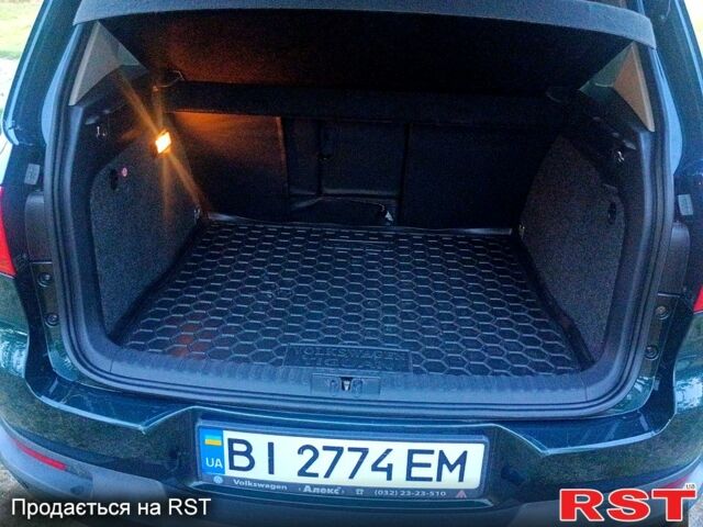 Зелений Фольксваген Тігуан, об'ємом двигуна 2 л та пробігом 280 тис. км за 13700 $, фото 3 на Automoto.ua